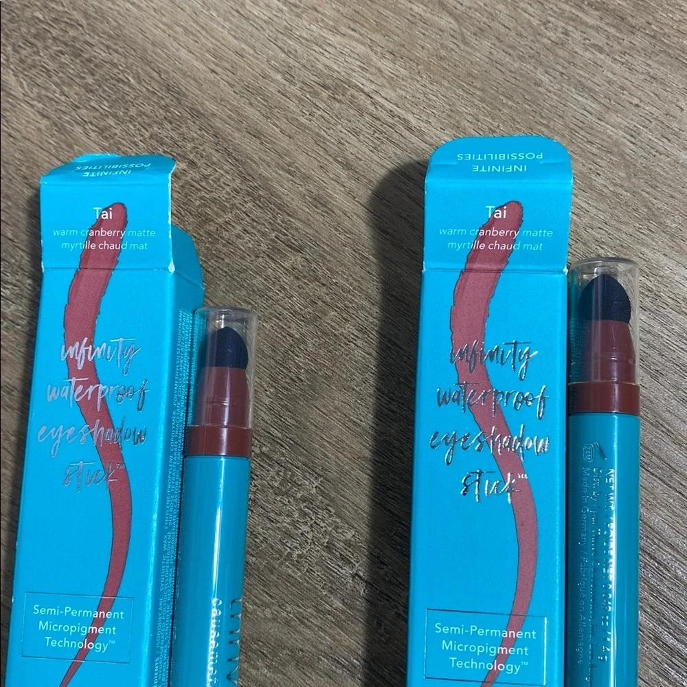 2 Thrive Causemetics Eyeshadow Sticks in Tai warm cranberry matte